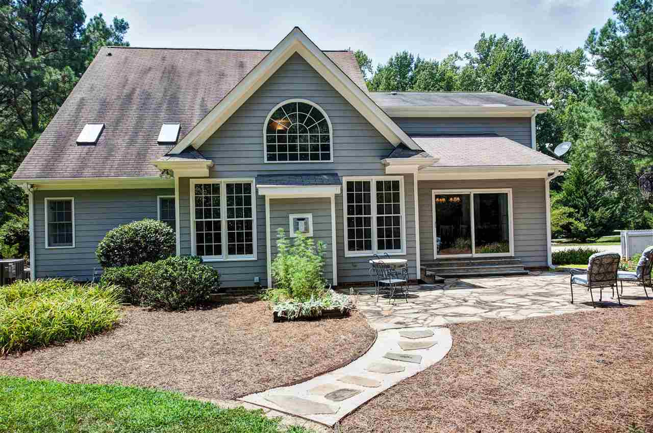 5320 Birchleaf Drive Raleigh, NC 27606 - Photo 24 of 25 Rear View of Home Patio and Garden