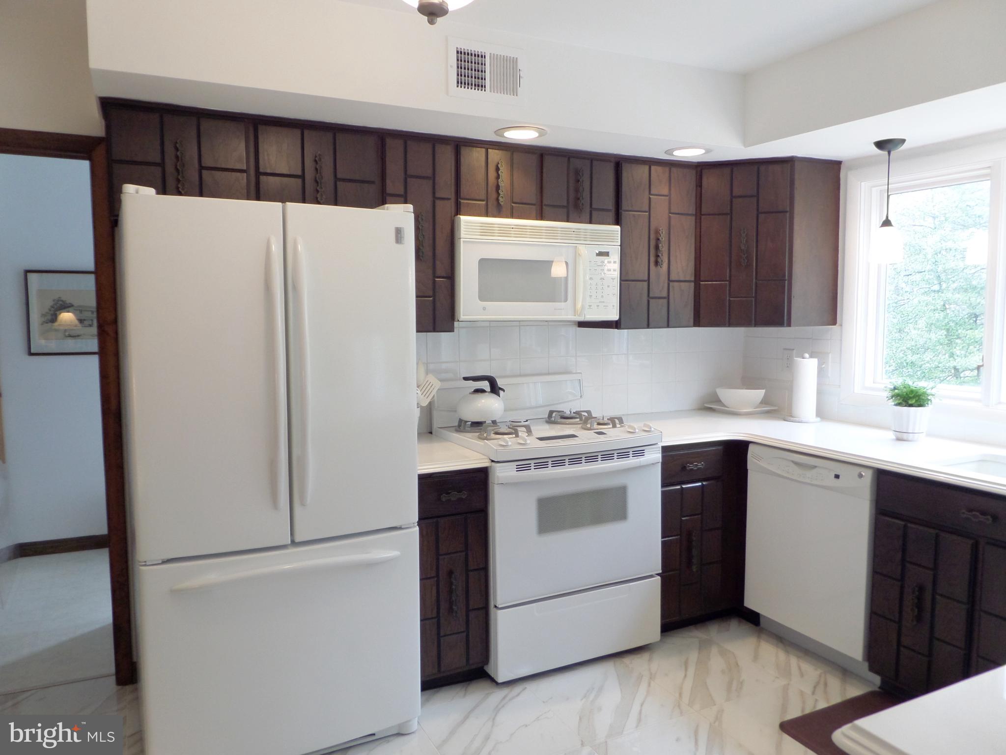 708 Custis Road Glenside, PA 19038 - Photo 21 of 61 Spotless white appliances right at your fingertips