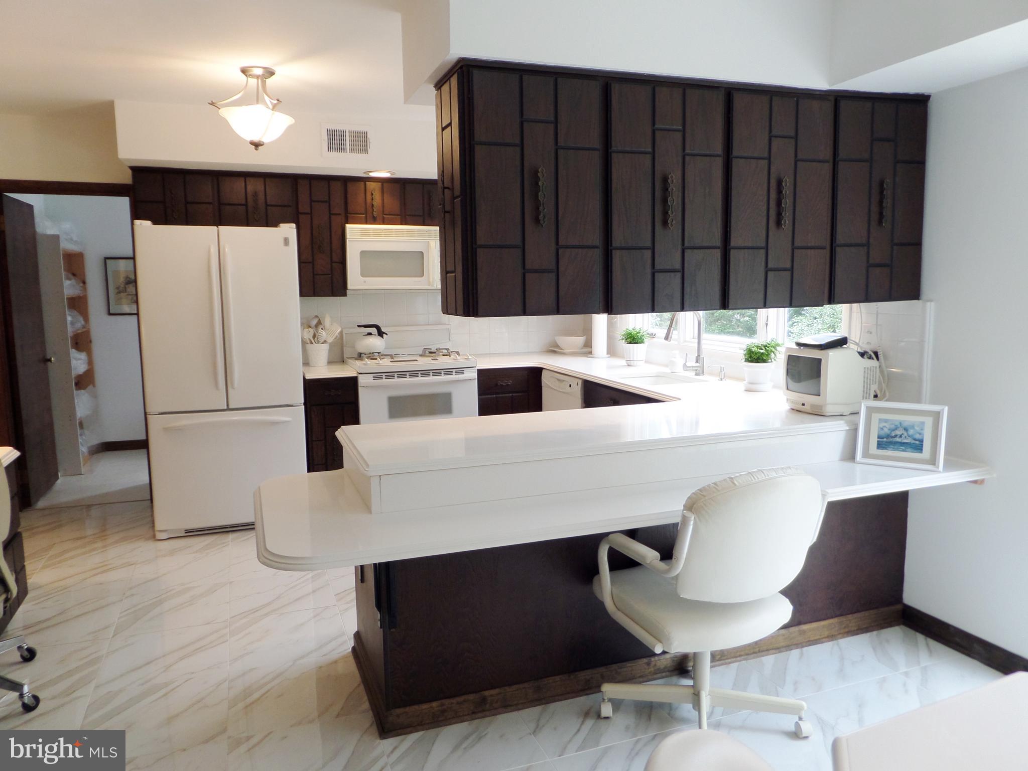 708 Custis Road Glenside, PA 19038 - Photo 22 of 61 Kitchen is adjacent to first floor laundry facilit