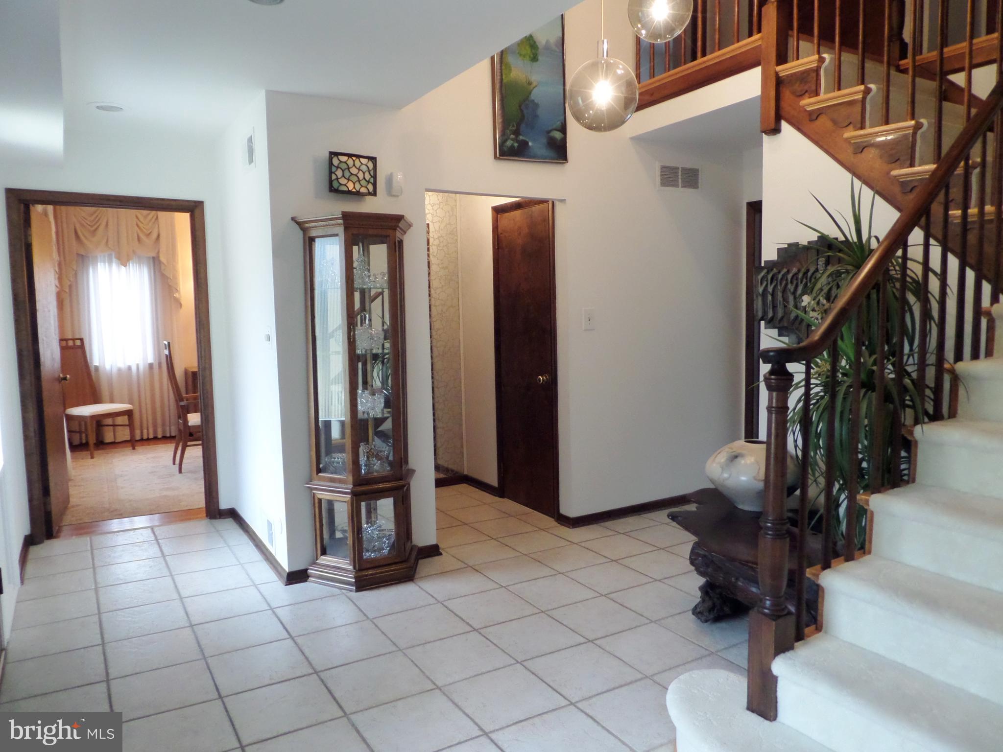 708 Custis Road Glenside, PA 19038 - Photo 8 of 61 2 story foyer with impressive turned stairs