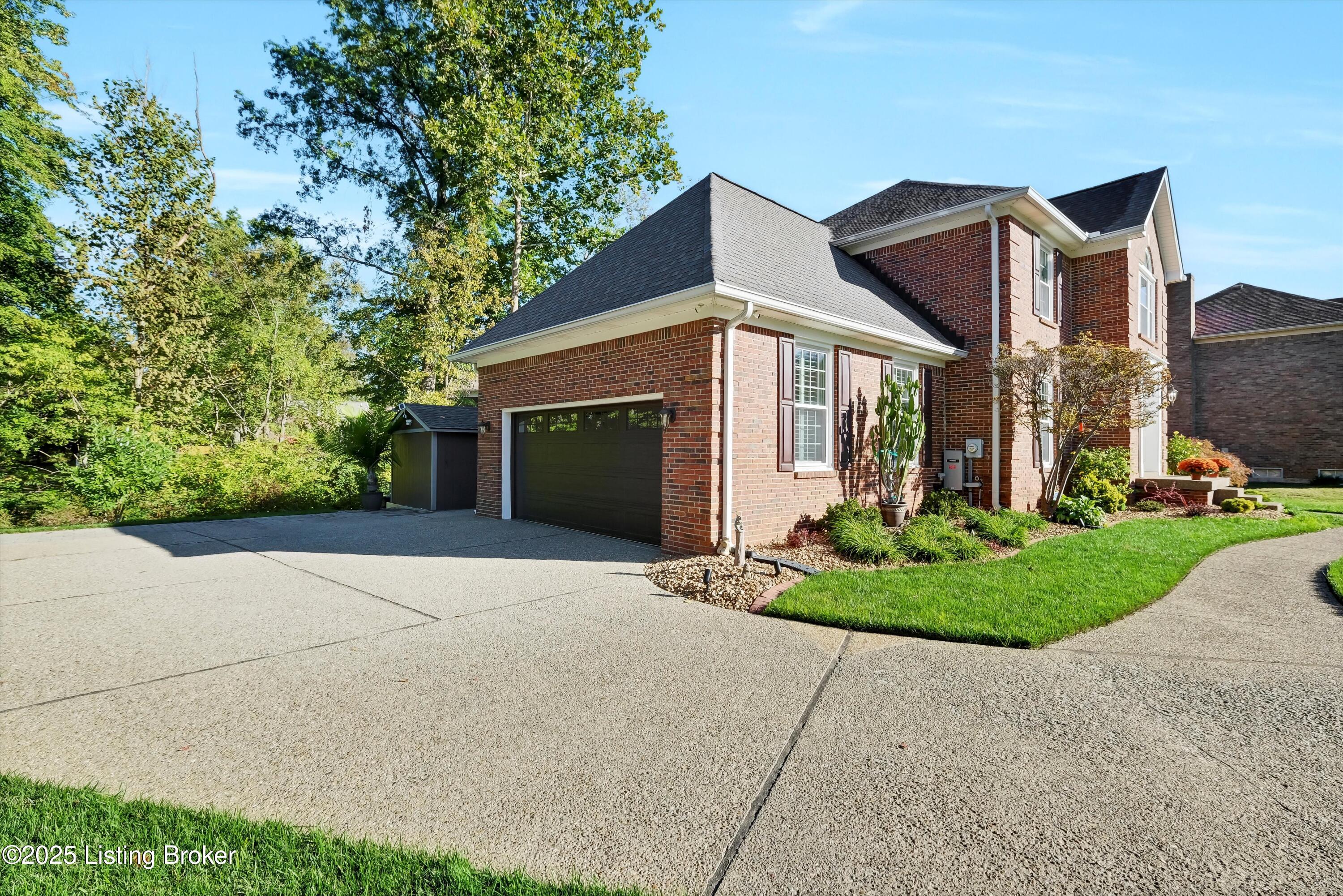 10612 Edgewater Road Louisville, KY 40223 - Photo 14 of 55 SSW Elevation - large driveway with additional parking