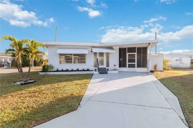 a view of a house with swimming pool