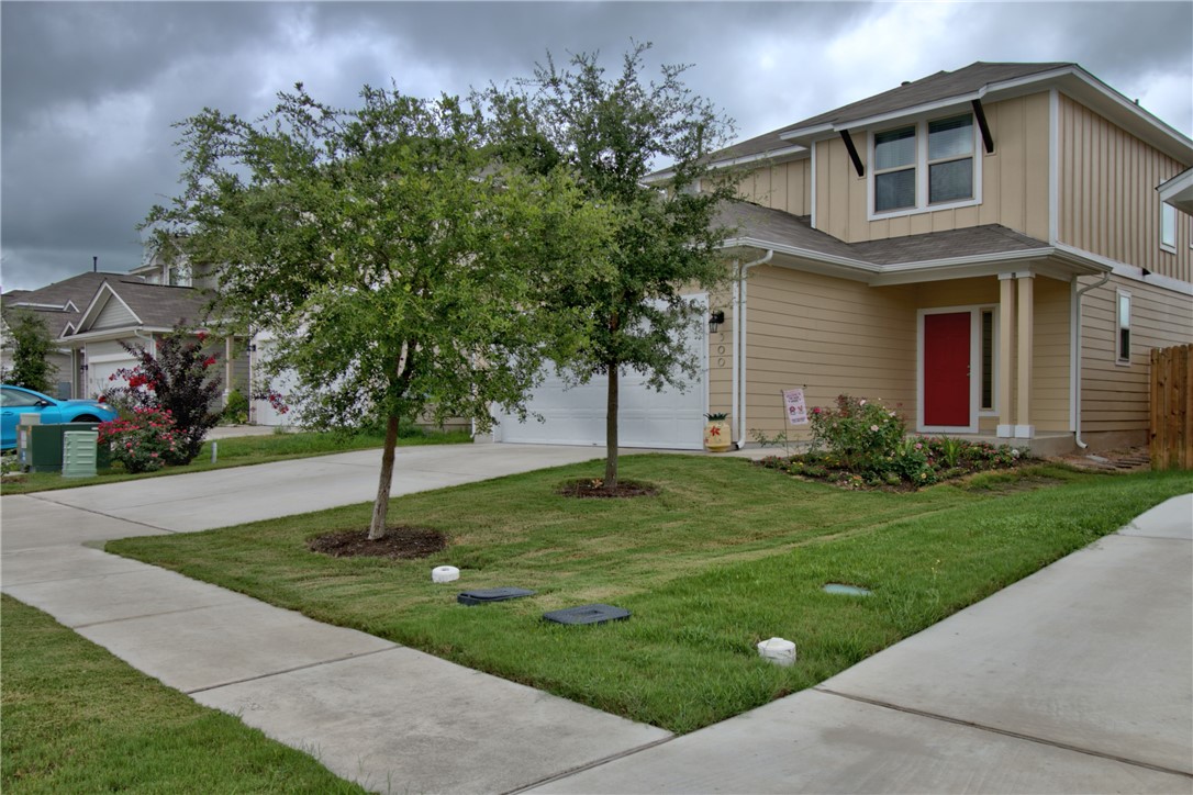 300 Wapiti Road Buda, TX 78610 - Photo 1 of 1 a backyard of a house with lots of green space