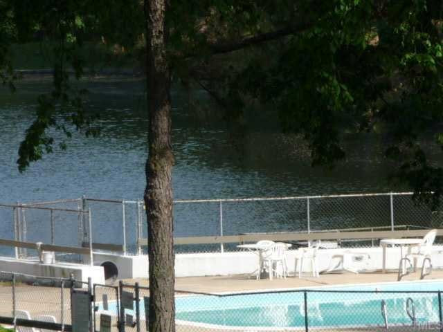 522 Pine Ridge Place Raleigh, NC 27609 - Photo 6 of 12 Enjoy the community pool, tennis court, walking trail around the lake... View