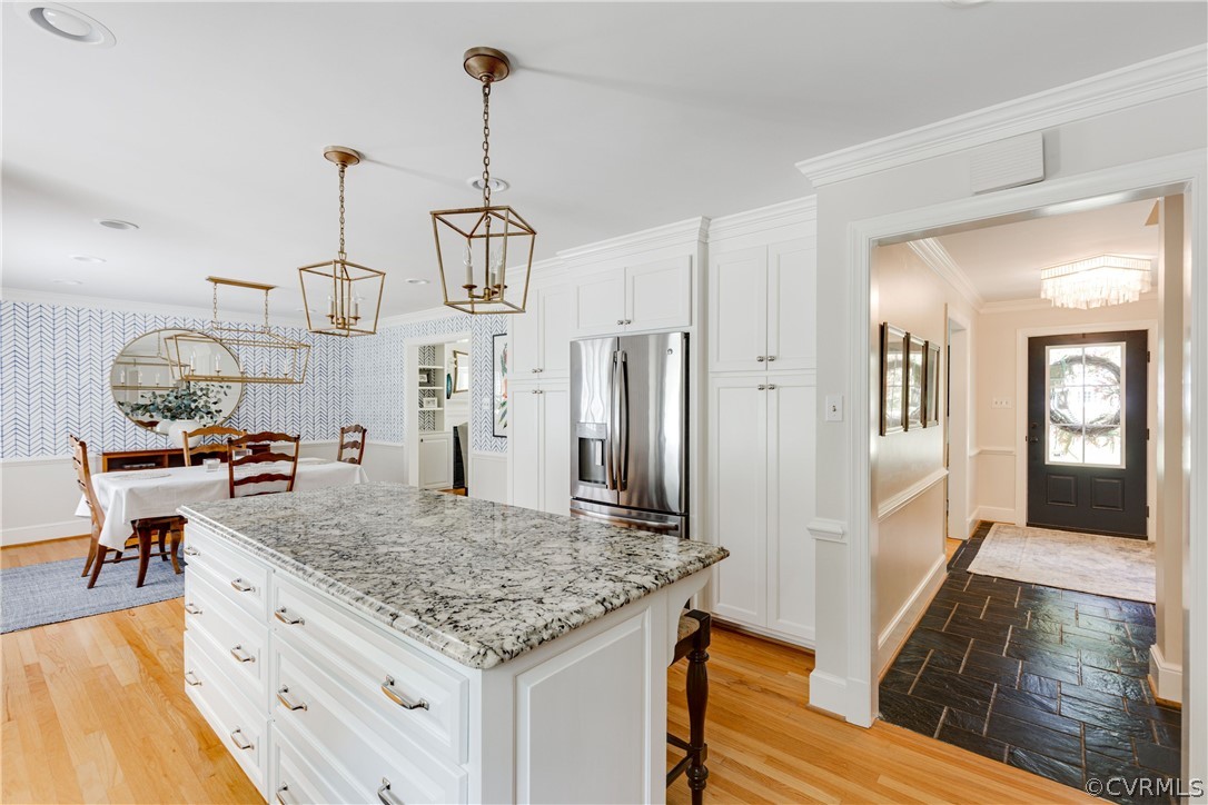 13331 Kingsmill Road Midlothian, VA 23113 - Photo 20 of 49 a kitchen with stainless steel appliances granite countertop stove top oven and refrigerator