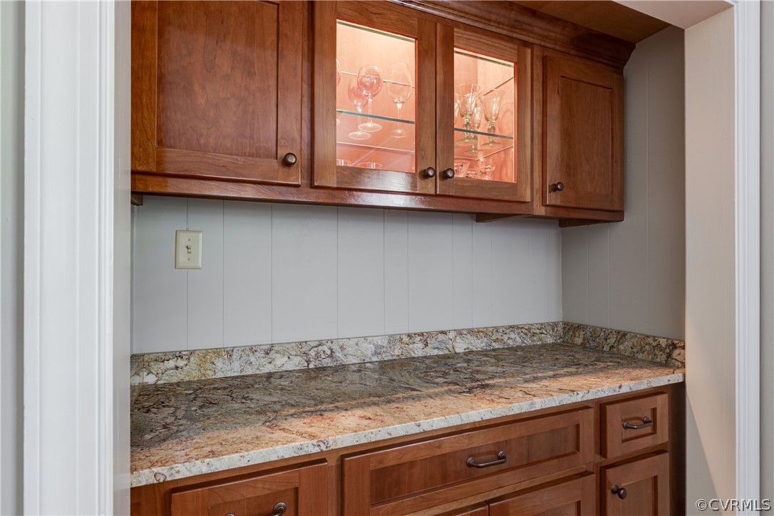 13331 Kingsmill Road Midlothian, VA 23113 - Photo 23 of 49 a view of wooden cabinets and a sink