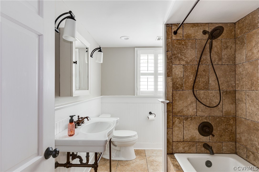 13331 Kingsmill Road Midlothian, VA 23113 - Photo 26 of 49 a bathroom with a sink toilet and shower