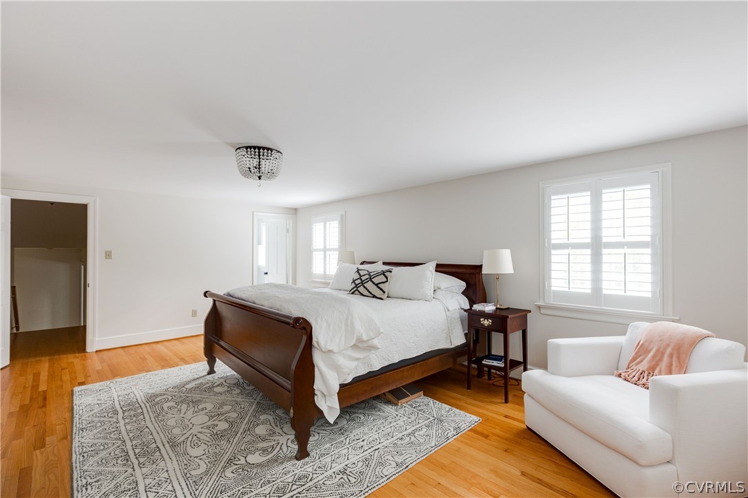 13331 Kingsmill Road Midlothian, VA 23113 - Photo 27 of 49 a spacious bedroom with a bed couch and a window