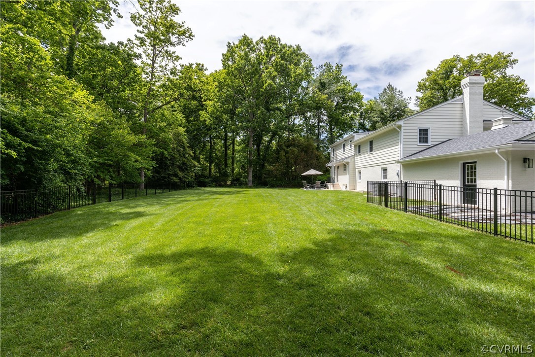 13331 Kingsmill Road Midlothian, VA 23113 - Photo 40 of 49 a view of a house with a yard and sitting area