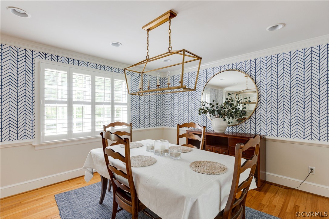 13331 Kingsmill Road Midlothian, VA 23113 - Photo 10 of 49 a view of a dining room with furniture and wooden floor