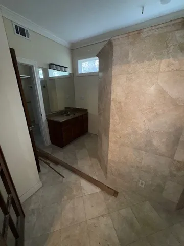 a view of a hallway with washer and dryer