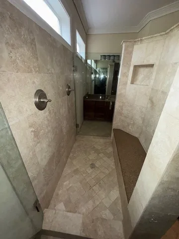 a view of an empty room with a window