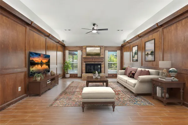 a living room with furniture and a rug