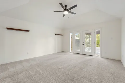 a bathroom with a tub and shower