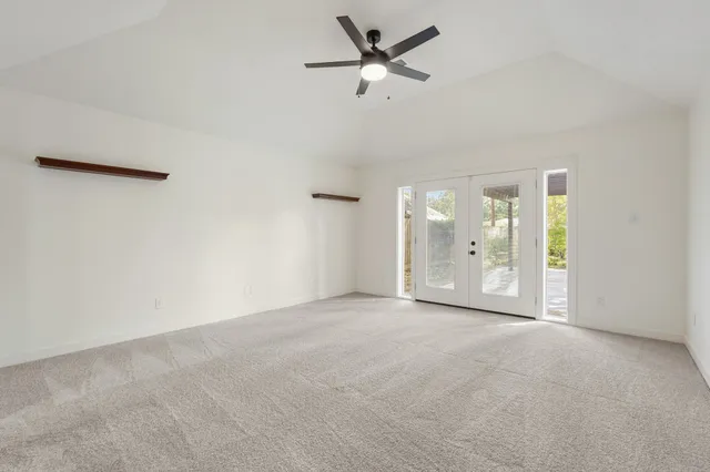 a bathroom with a tub and shower