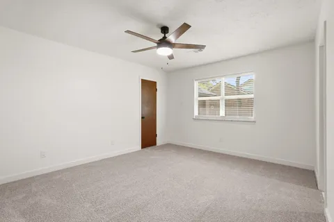 a view of a livingroom with furniture and window