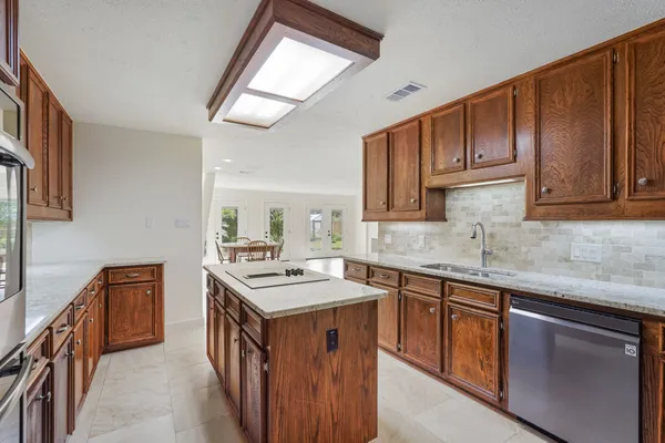 a view of a livingroom with furniture and window