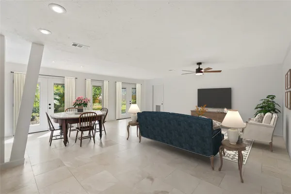 a view of a livingroom with furniture and chandelier