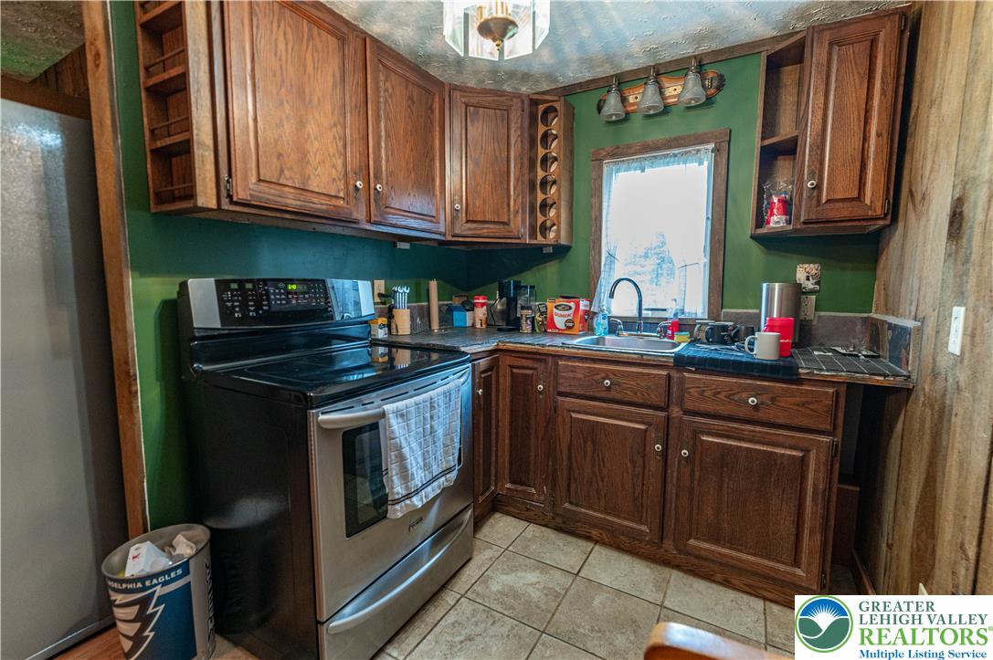 2485 Hieter Road Quakertown, PA 18951 - Photo 61 of 97 A compact kitchen offers essential amenities for everyday culinary needs.