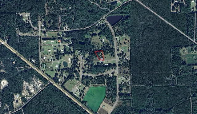 a picture of a bathroom with a shower