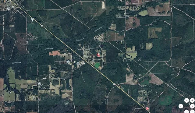 a view of a swimming pool and a big yard