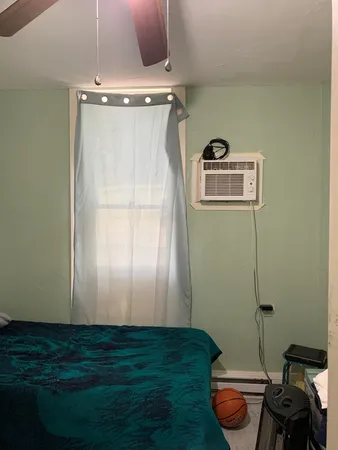 a view of a workspace with furniture