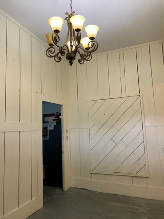 a view of a room with rack on the wall