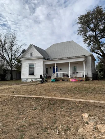 a view of a house with a patio
