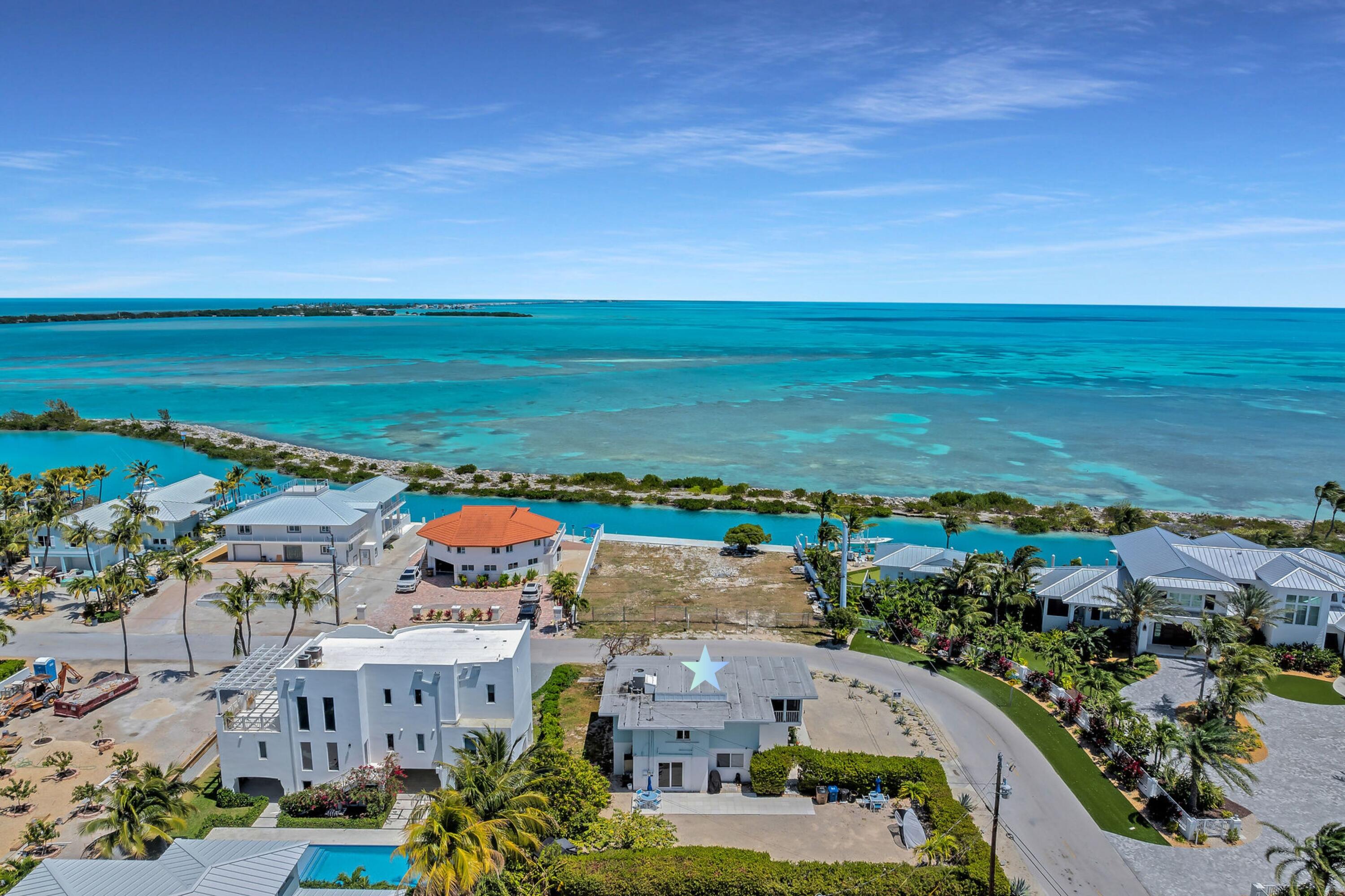 a view of city with ocean