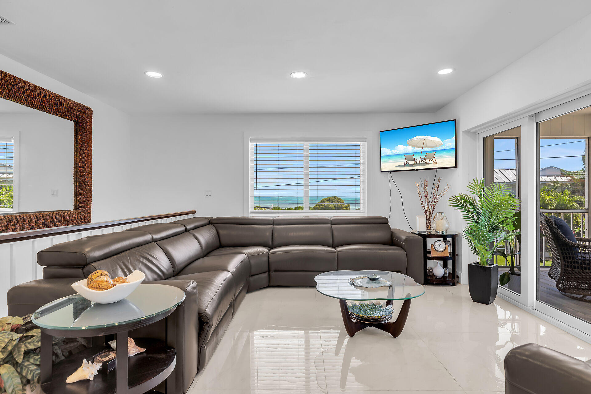 309 Jasmine Street Duck Key, FL 33050 - Photo 12 of 37 a living room with furniture and a potted plant