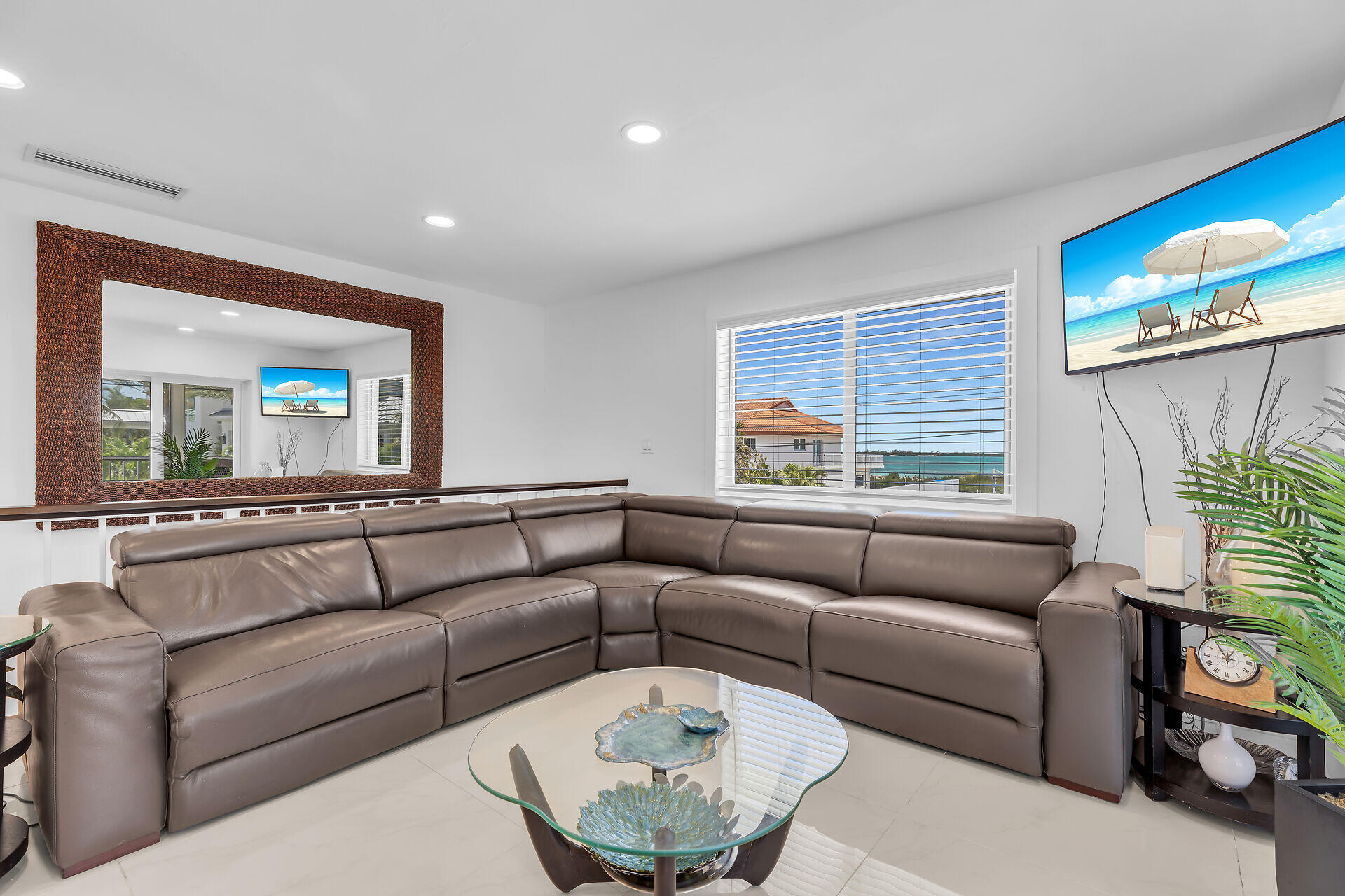 309 Jasmine Street Duck Key, FL 33050 - Photo 13 of 37 a living room with furniture and a large window