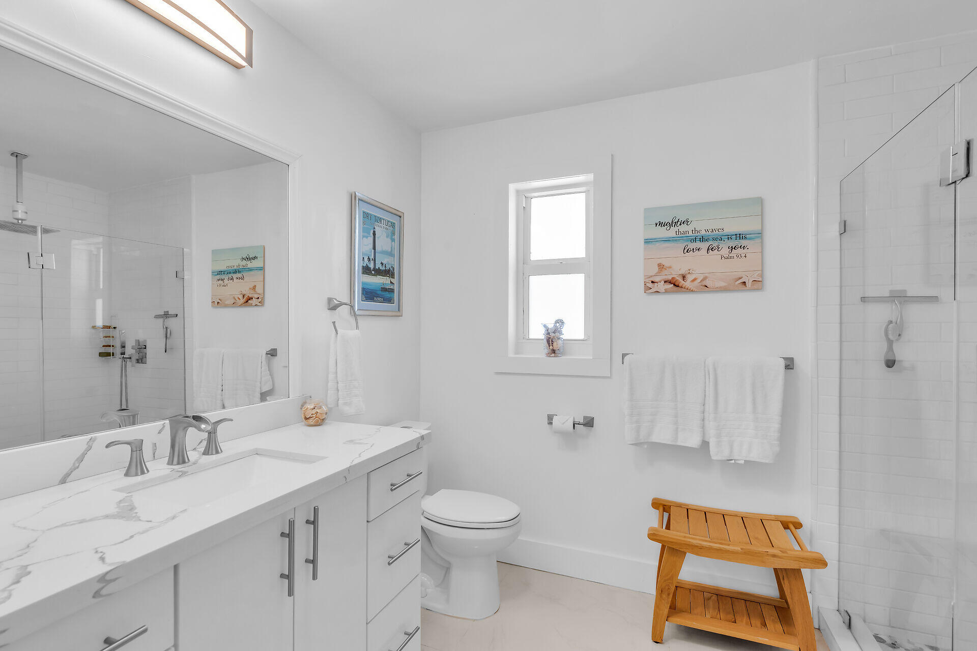 309 Jasmine Street Duck Key, FL 33050 - Photo 26 of 37 a bathroom with a toilet sink and mirror