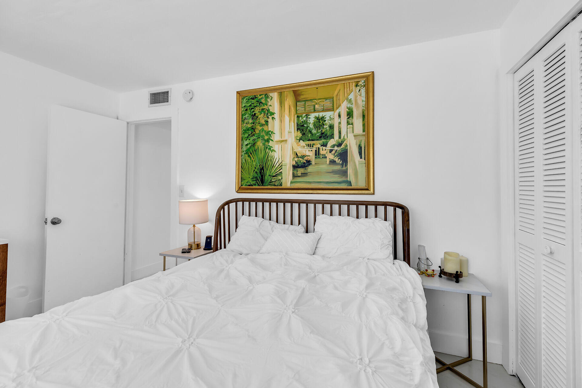 309 Jasmine Street Duck Key, FL 33050 - Photo 31 of 37 a large white bed in a bedroom next to a window