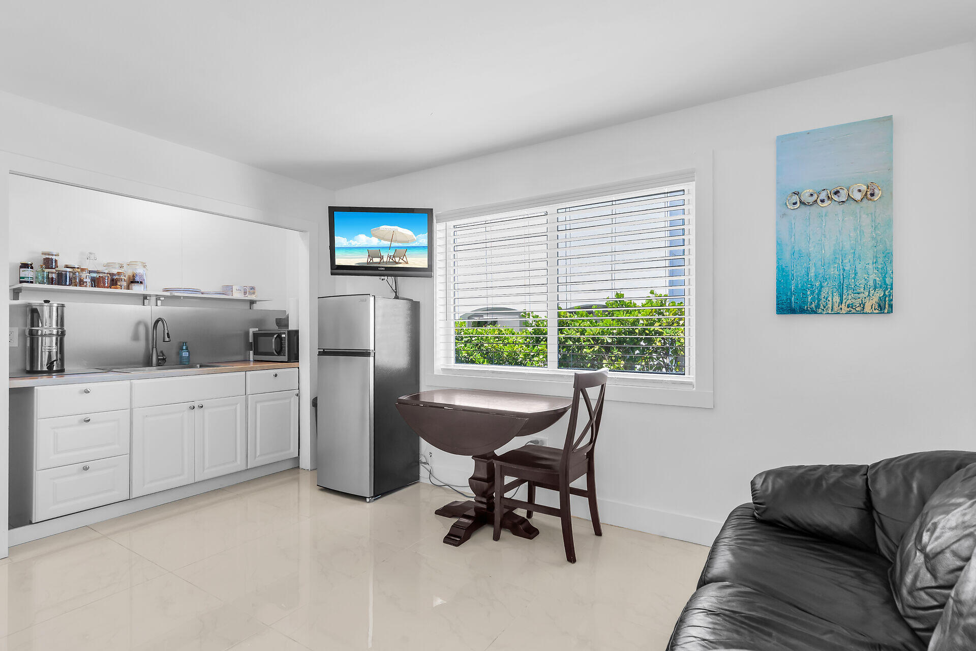 309 Jasmine Street Duck Key, FL 33050 - Photo 36 of 37 a living room with furniture and a window