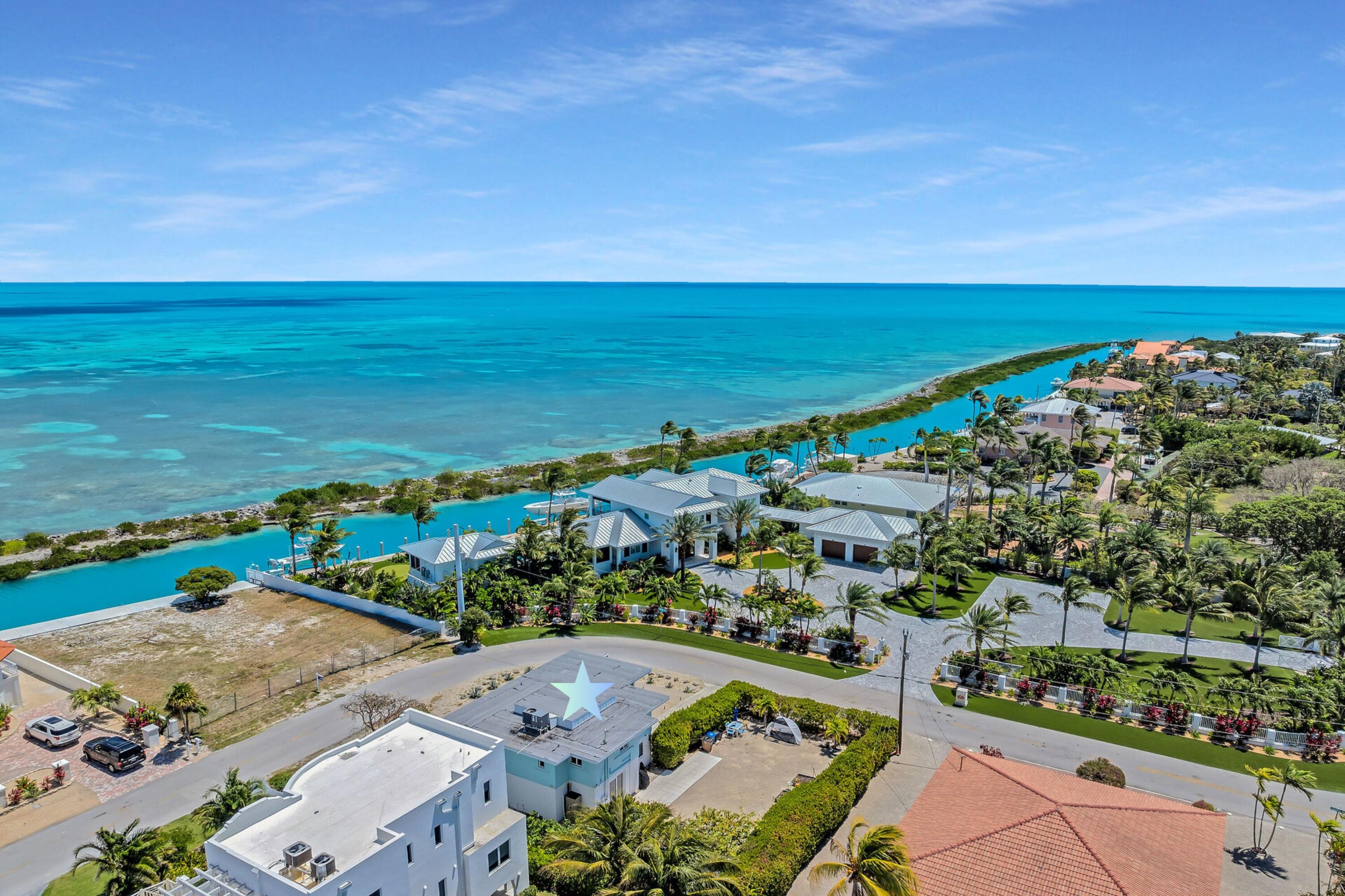 309 Jasmine Street Duck Key, FL 33050 - Photo 6 of 37 an aerial view of ocean and residential houses with outdoor space