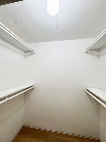 a view of a room with racks on the wall