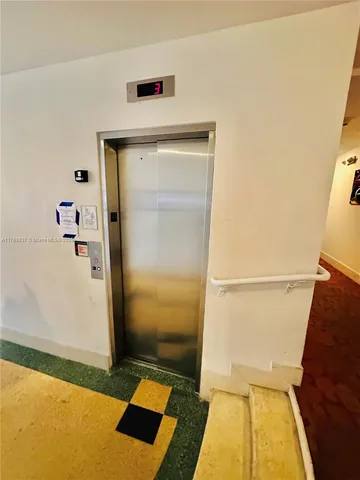 a bathroom with a tub and shower