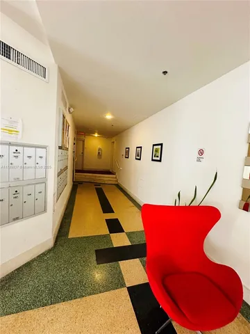 a room with furniture and a rug