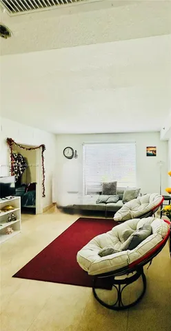 a room with furniture and view