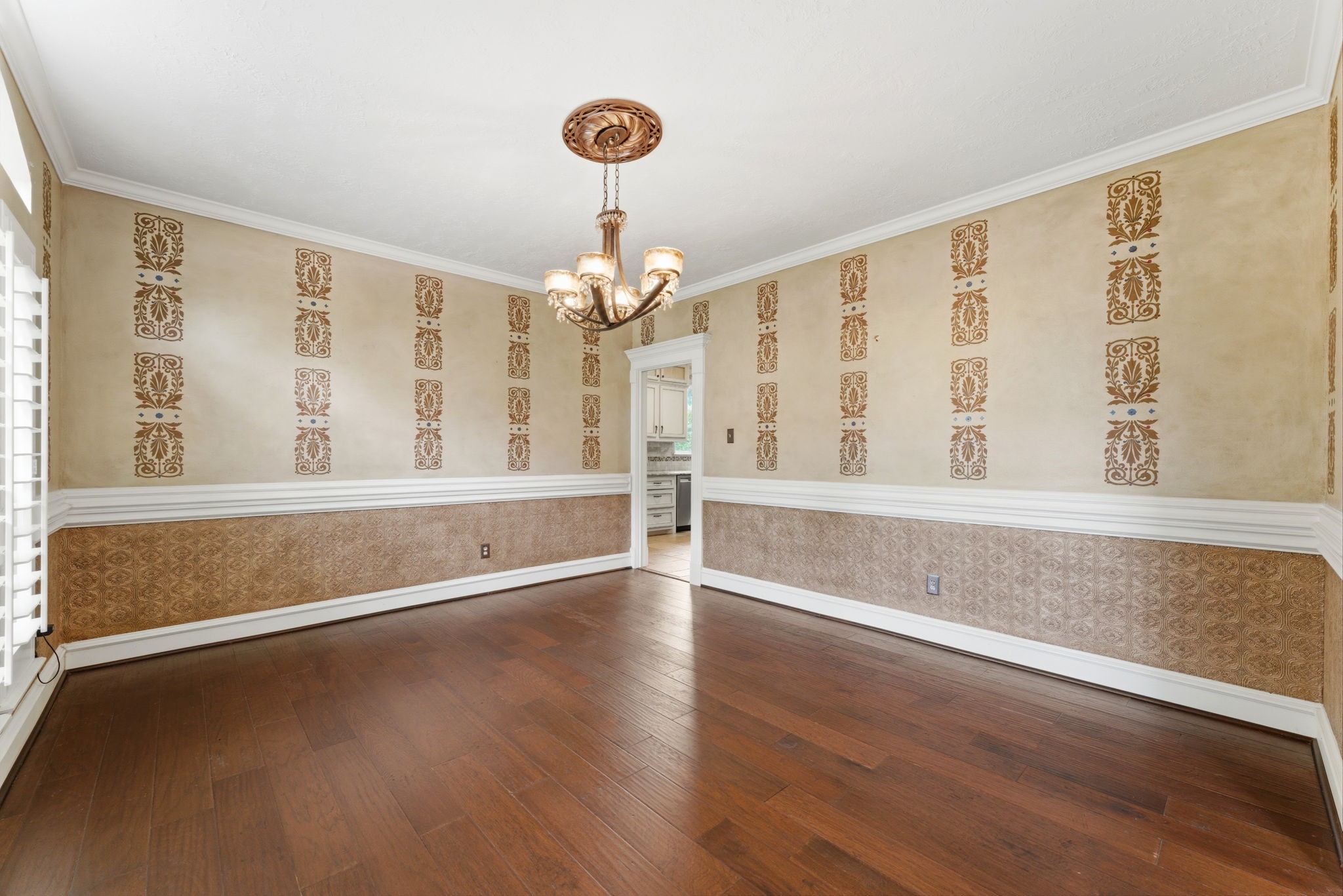 13807 Balmore Circle Houston, TX 77069 - Photo 13 of 30 a view of an empty room with wooden floor and a window