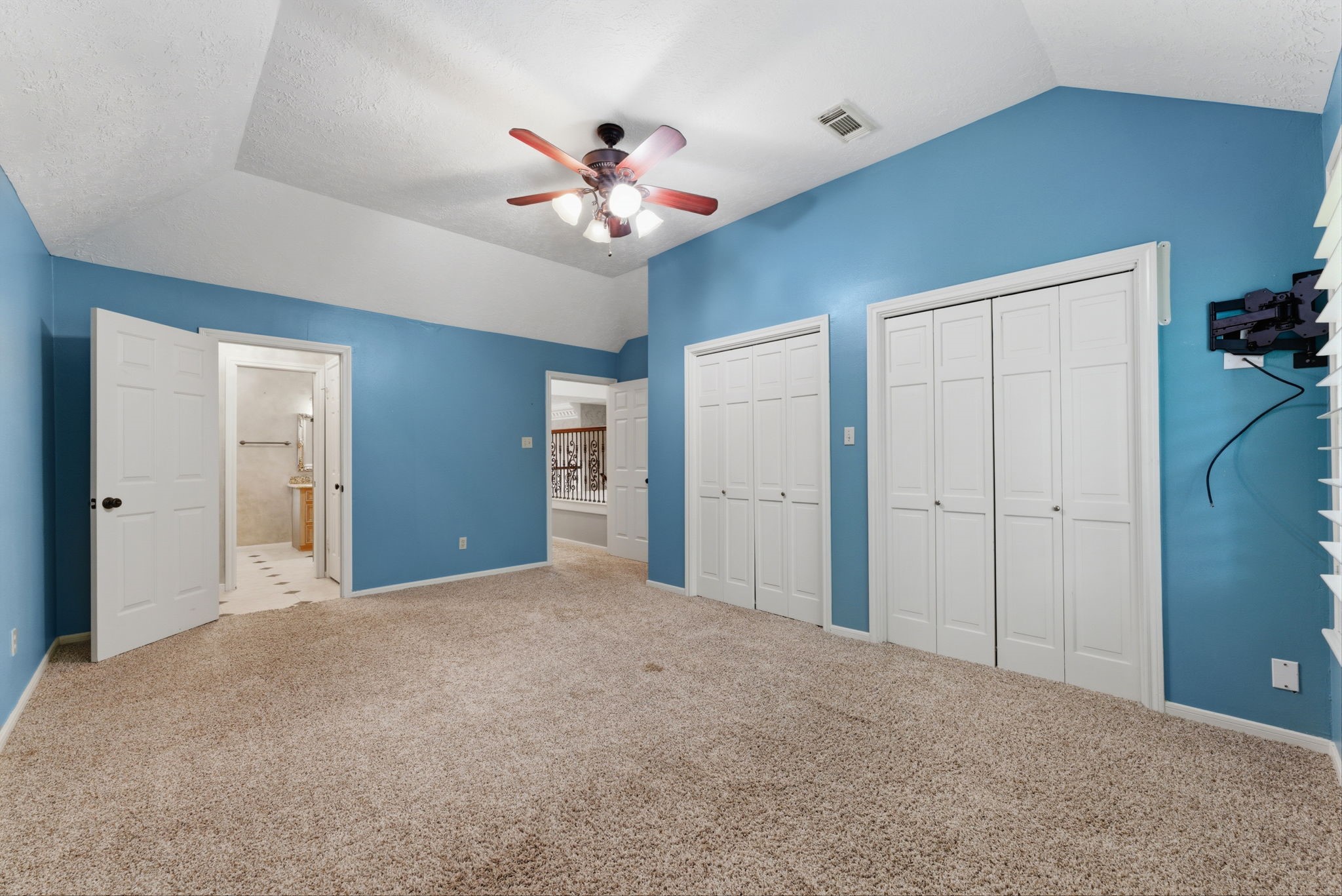 13807 Balmore Circle Houston, TX 77069 - Photo 25 of 30 a view of an empty room with a chandelier fan