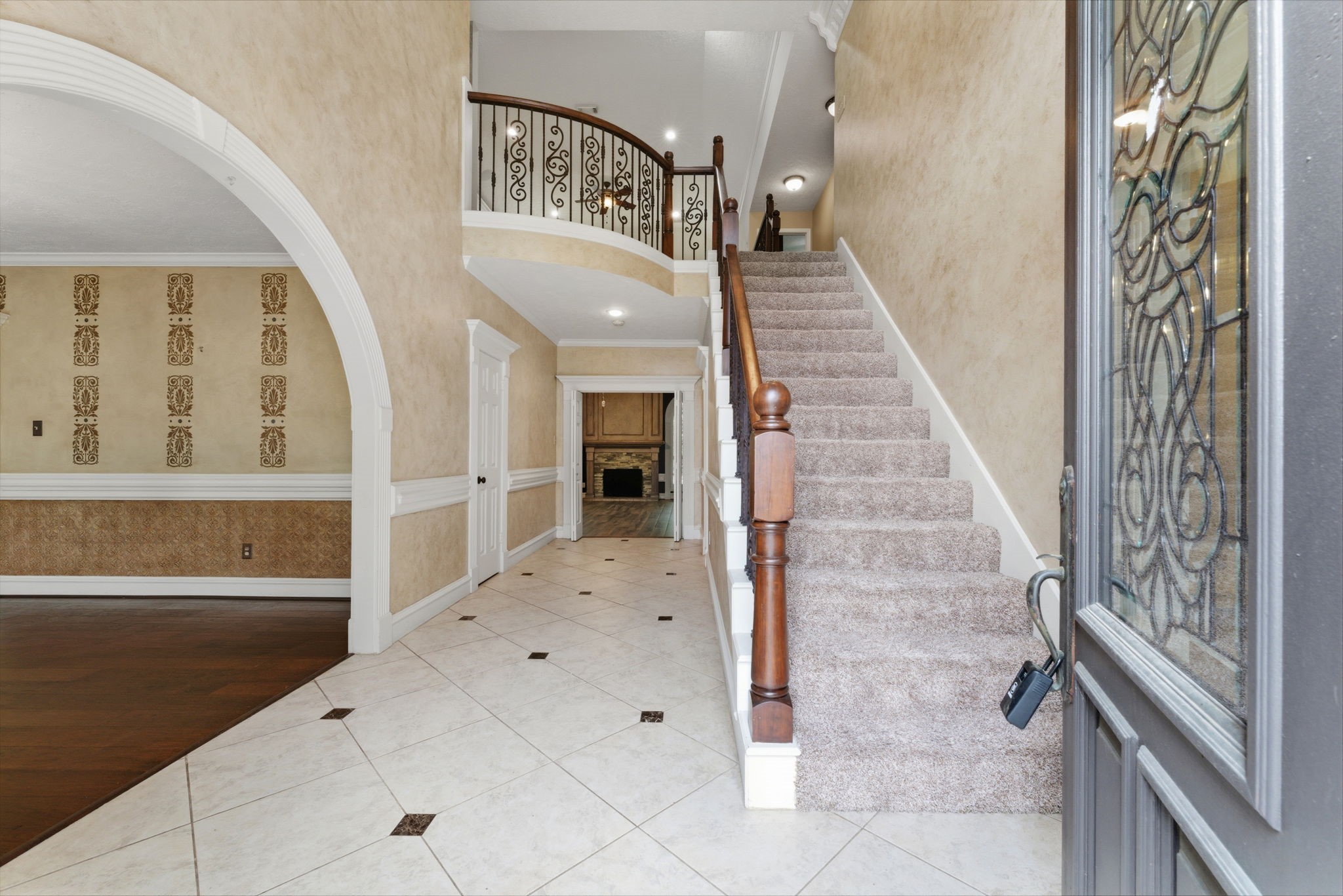 13807 Balmore Circle Houston, TX 77069 - Photo 4 of 30 a view of entryway and hall with wooden floor