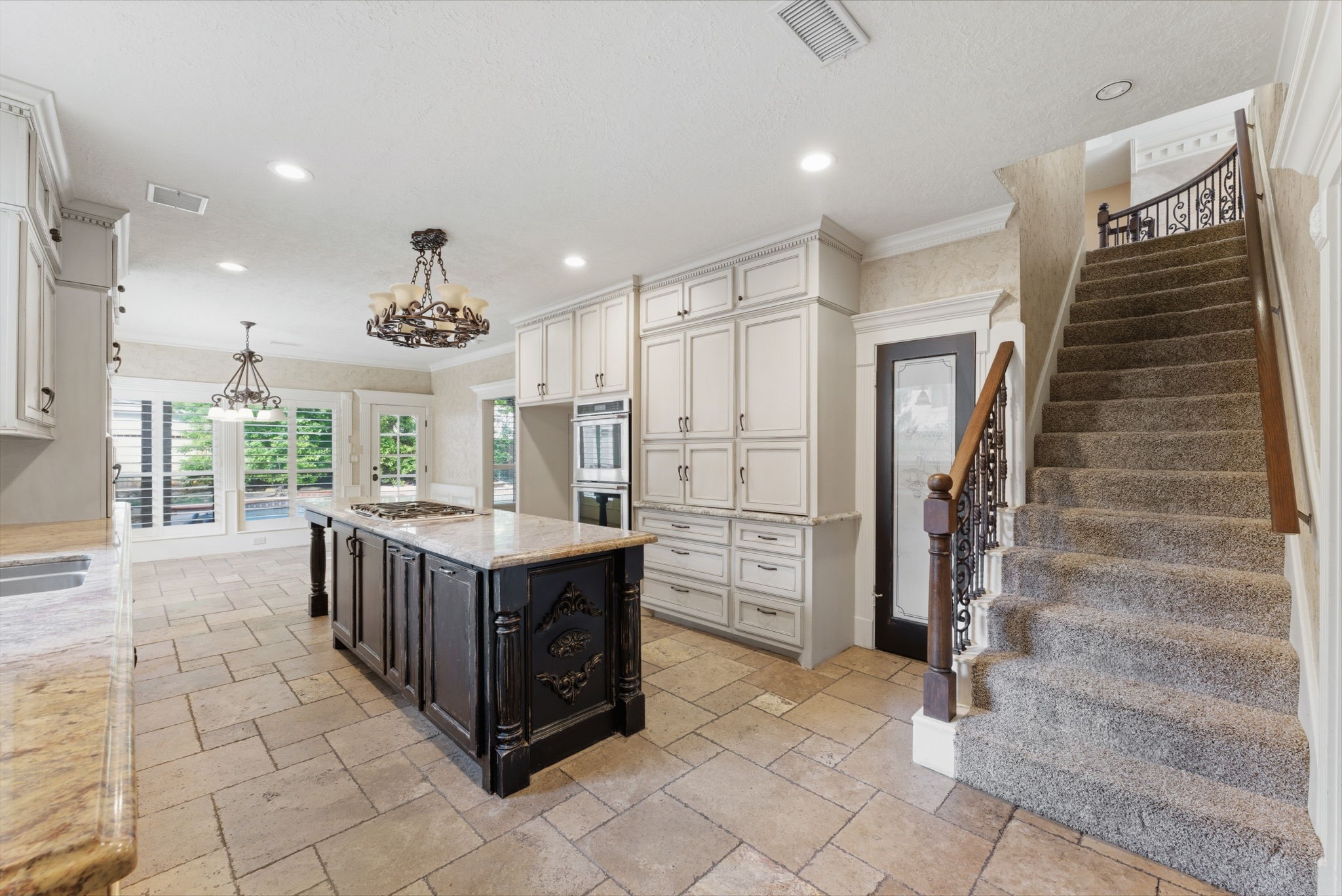 13807 Balmore Circle Houston, TX 77069 - Photo 5 of 30 a kitchen with stainless steel appliances kitchen island granite countertop a stove and a refrigerator