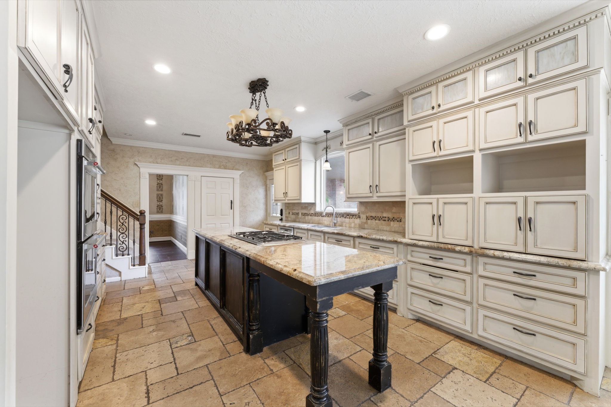 13807 Balmore Circle Houston, TX 77069 - Photo 6 of 30 a kitchen with stainless steel appliances granite countertop a stove and a refrigerator