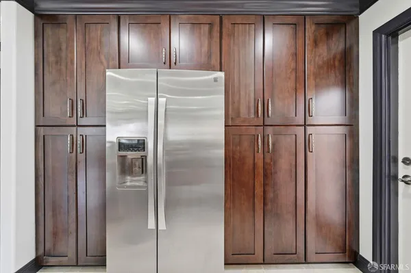 a kitchen with stainless steel appliances granite countertop a stove and a sink