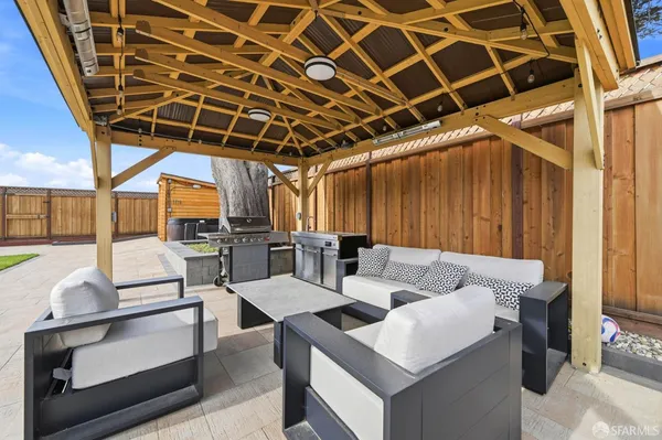 a view of street with wooden fence