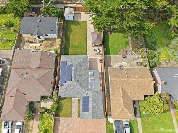 a view of a swimming pool with a yard