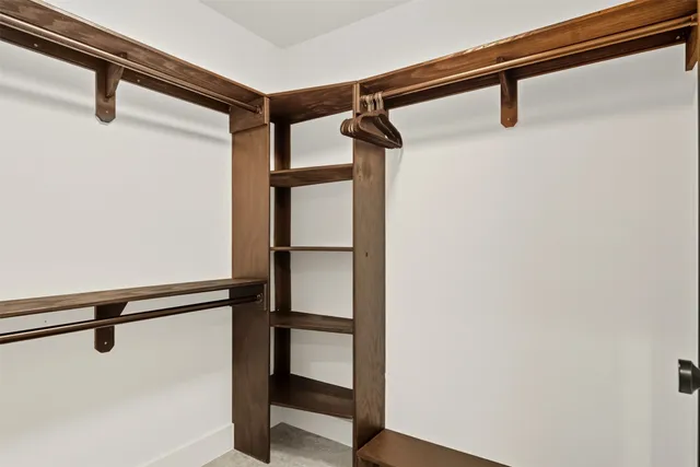 a picture of a bench in front of a window