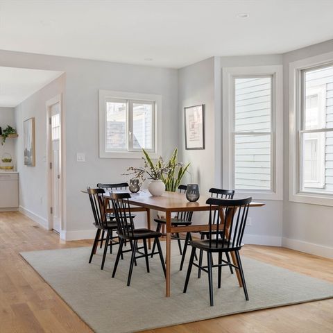 a view of living room with furniture and a window