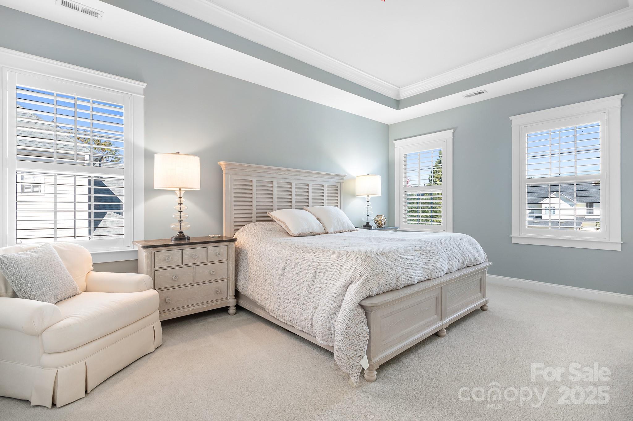 15826 Trenton Place Road Huntersville, NC 28078 - Photo 14 of 32 a bedroom with bed and white couch